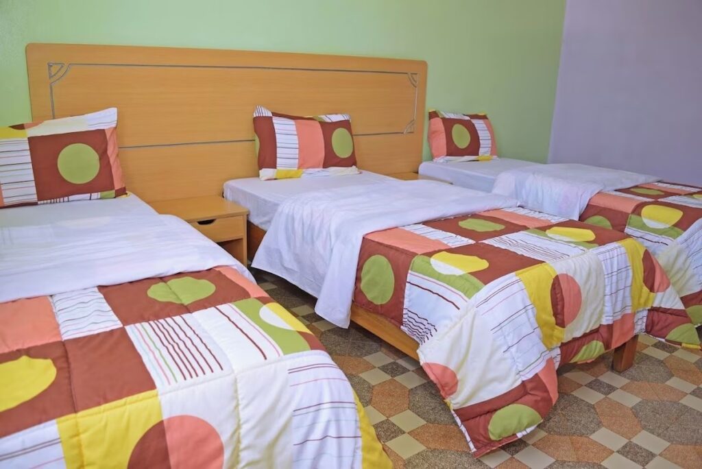 Deluxe Triple Room at Taita Luxury Hotel
